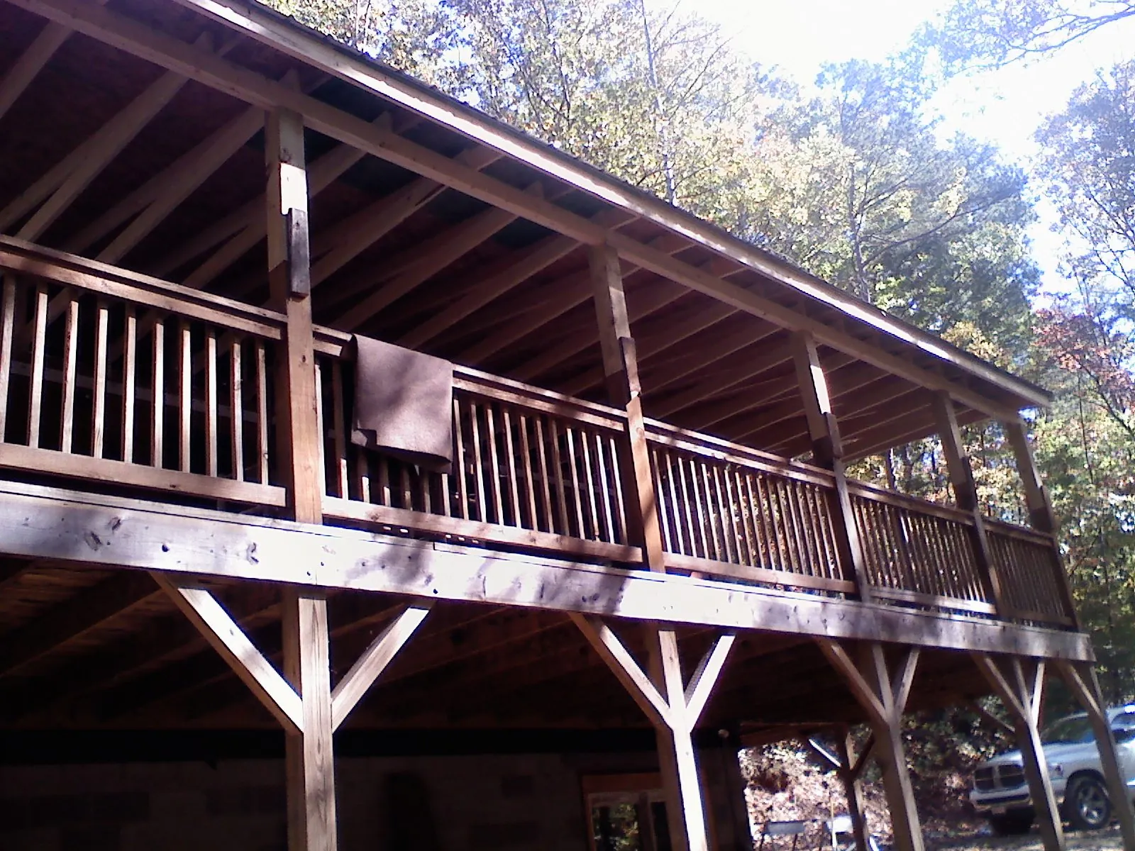 Timber framing under a new elevated porch and deck — Roof Leak Repair in Hector by Roofing Brothers